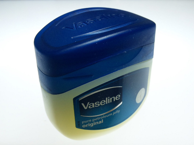 A jar of petroleum jelly. While a common ingredient, it may not be one of the best ingredients for dry skin as it doesn't provide the benefits of physiological lipids like ceramide.